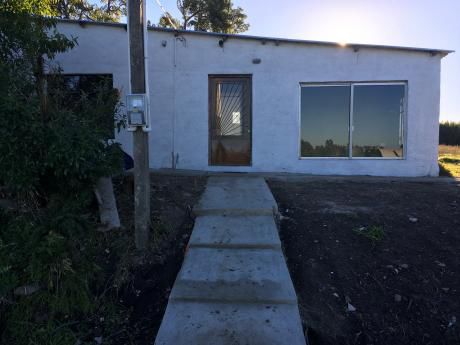 Casa Con Fondo Reciclada