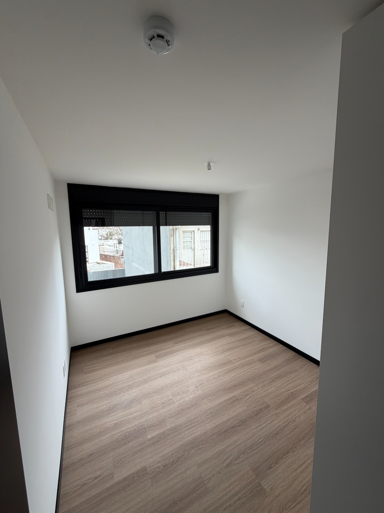Apartamento 1 dormitorio, cochera, terraza · Foto 11