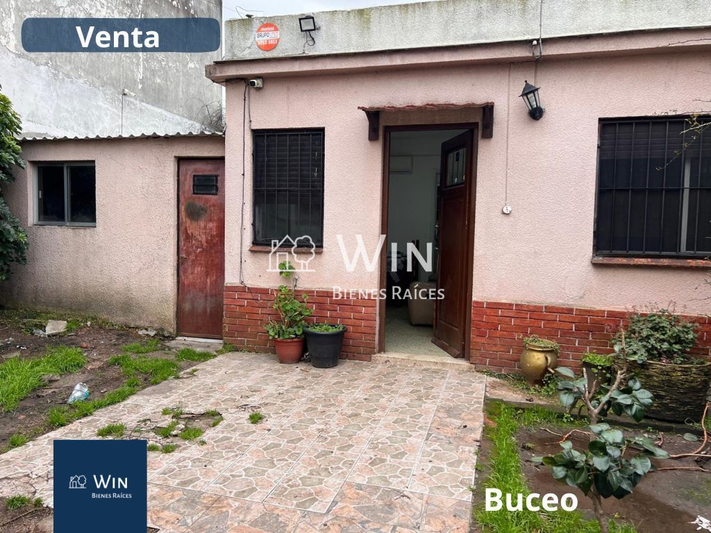 Venta Casa Buceo 1 dormitorio escritorio, cochera doble, jardin al frente