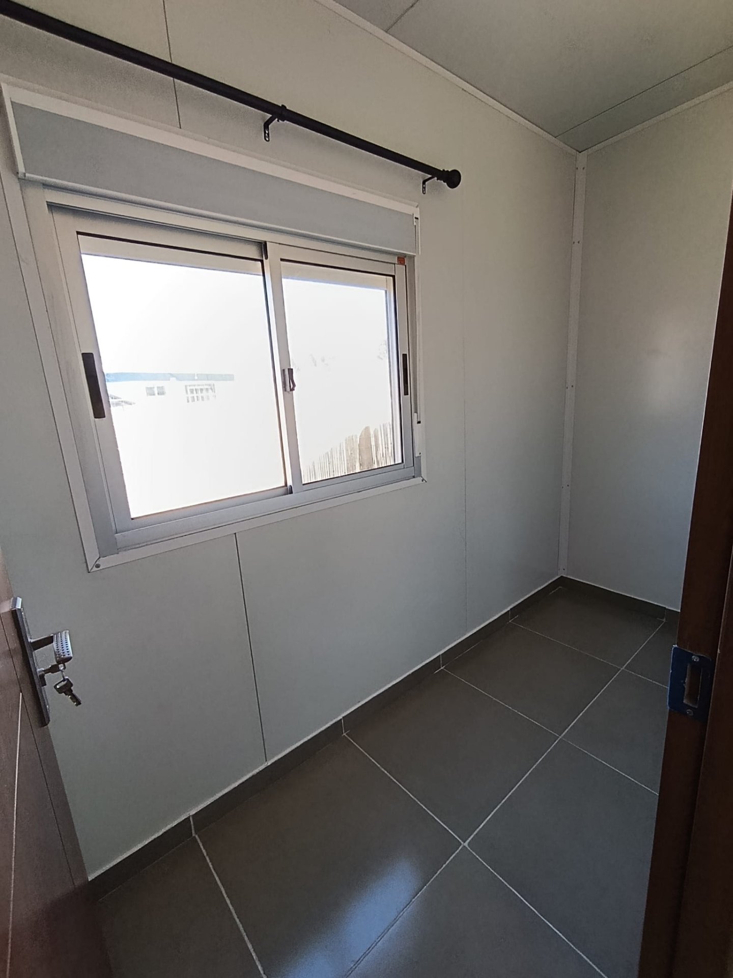 Alquiler Casa  El Pinar 1 dormitorio 1 habitación pequeña para vestidor o oficina con Estacionamento Sin gastos Comunes Con Parrillero A ESTRENAR · Foto 6