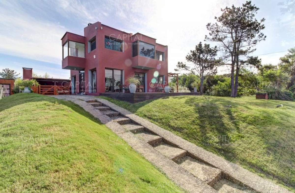 Casa frente al mar en Punta Piedras, 4 dormitorios