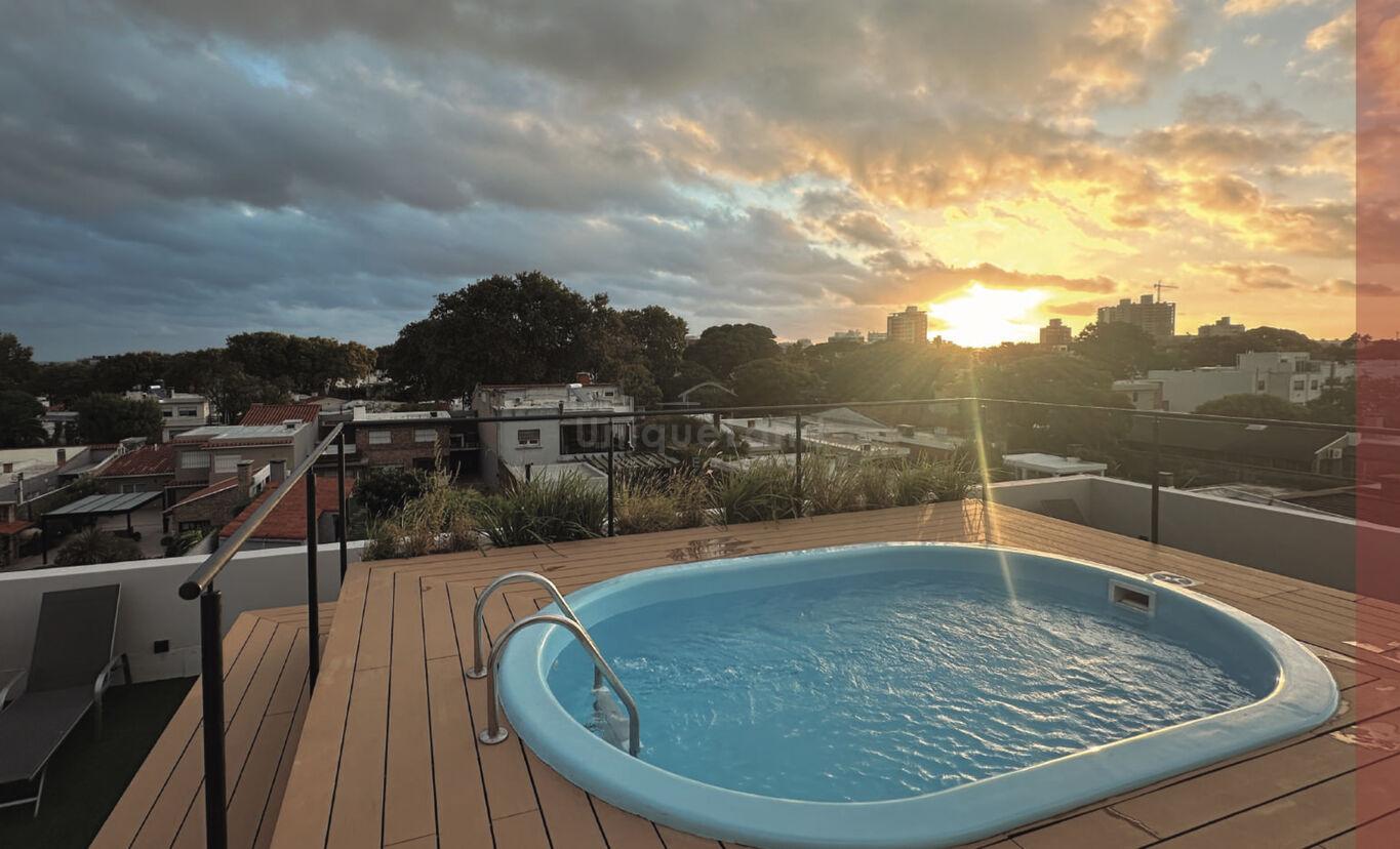 Apartamento de 1 dormitorio en Malvín-Edificio Cathan-Piscina-Cochera opcion · Foto 3