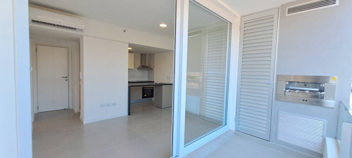 DEPARTAMENTO DE 1 DORMITORIO CON BALCÓN Y PARRILLA – EDIFICIO ÁREA — foto 2