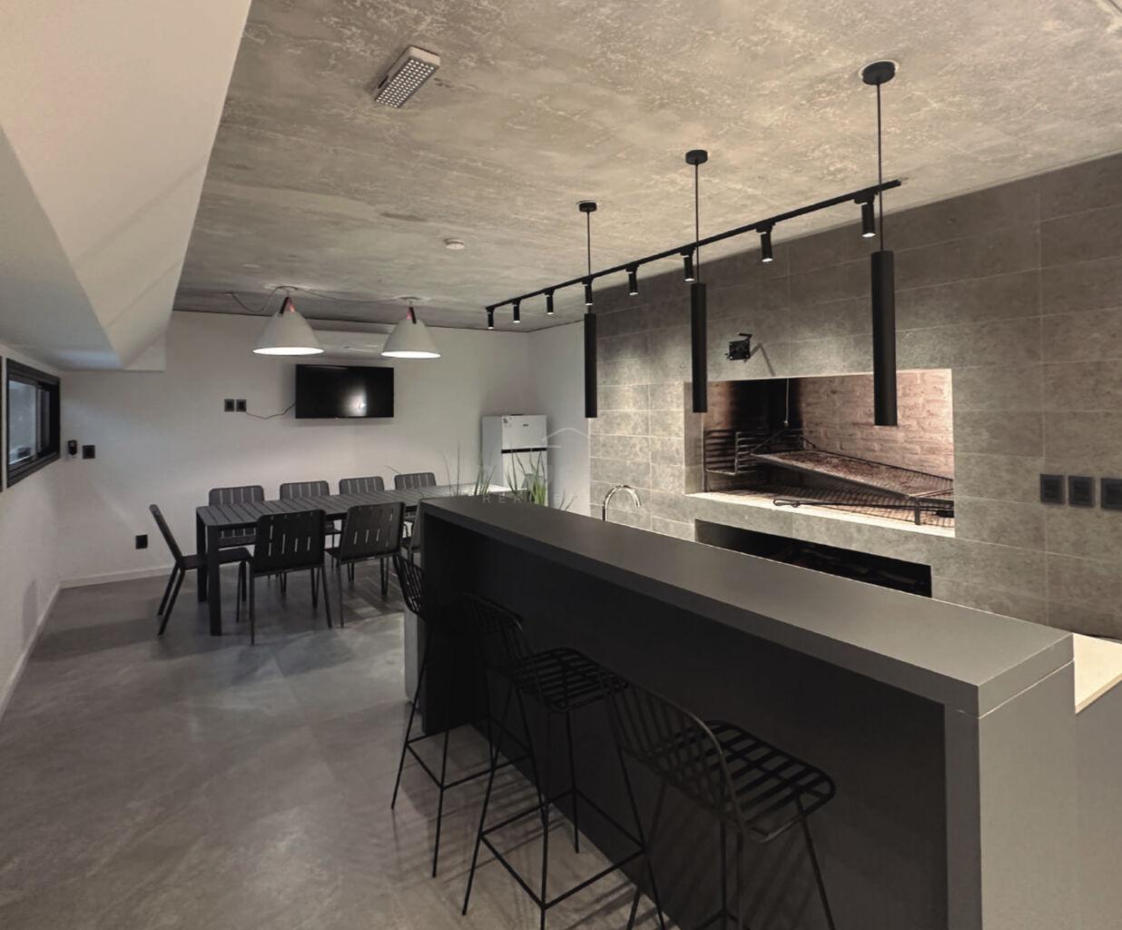 Apartamento de 1 dormitorio en Malvín-Edificio Cathan-Piscina-Cochera opcion · Foto 2