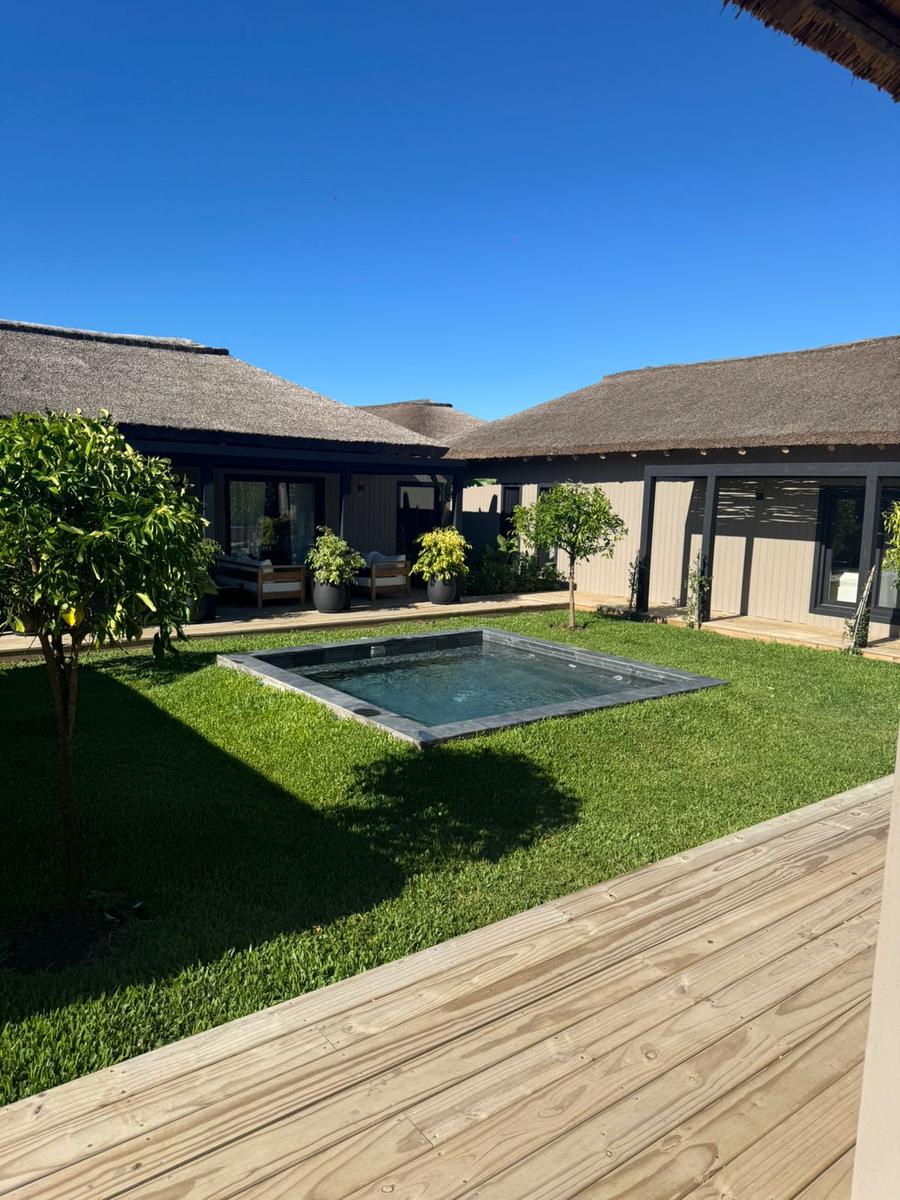 Venta y alquiler de espectacular Casa 4 suites en barrio privado Puerto Quetzal en La Barra · Photo 2