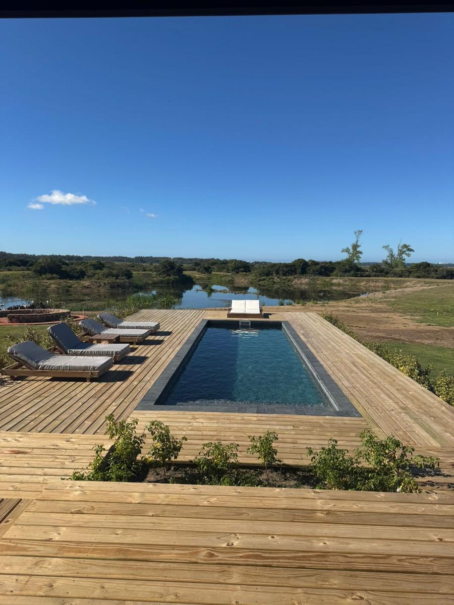 Venta y alquiler de espectacular Casa 4 suites en barrio privado Puerto Quetzal en La Barra · Photo 3