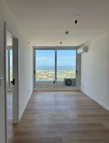 Apartamento en alquiler 1 dormitorio a estrenar ventura. Piso 14 excelente vista. Con cochera incluida. Carrasco Tower. Parque Miramar. · Foto 4
