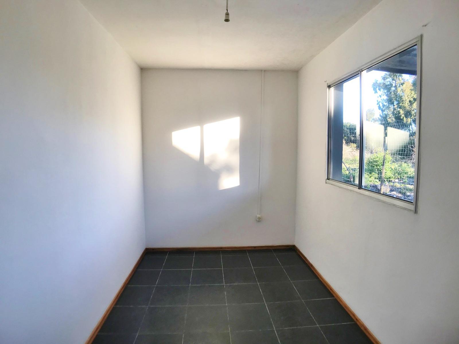 Apartamento en Alquiler de 1 dormitorio con opción a 2 y patio en complejo Barrio El General, Colonia · Foto 8