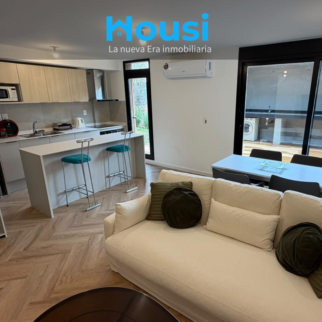 Alquiler Apartamento 2 dormitorios amoblado con patio y garaje en Barra de Carrasco · Foto 1