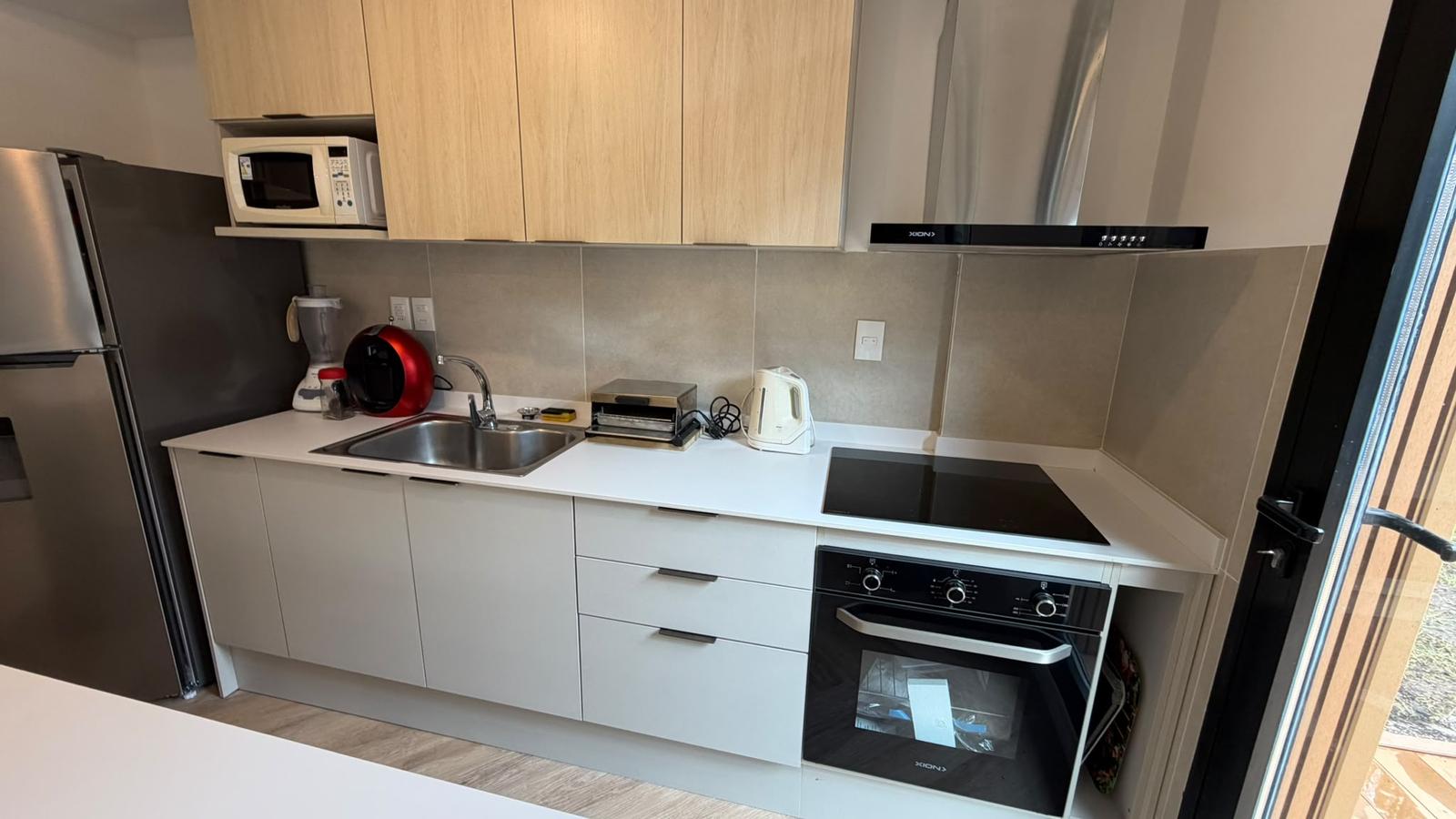 Alquiler Apartamento 2 dormitorios amoblado con patio y garaje en Barra de Carrasco · Foto 7