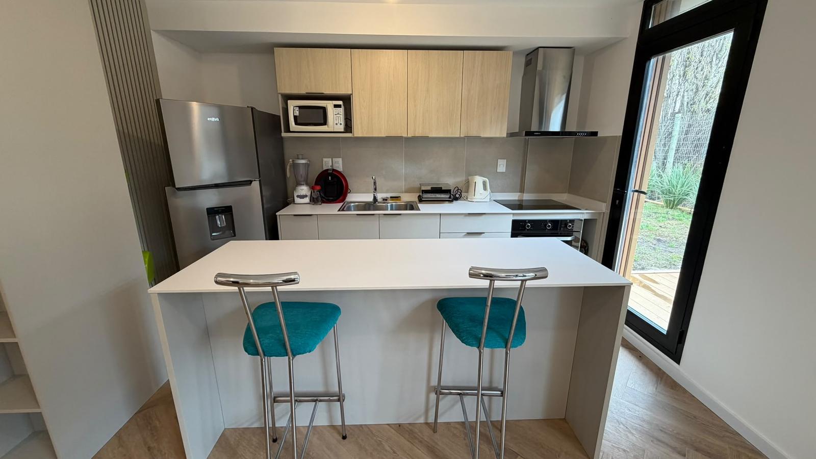 Alquiler Apartamento 2 dormitorios amoblado con patio y garaje en Barra de Carrasco · Foto 8